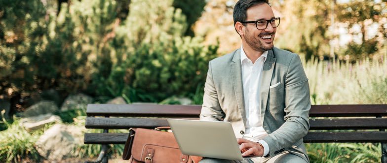 Man filling out a business loan application content