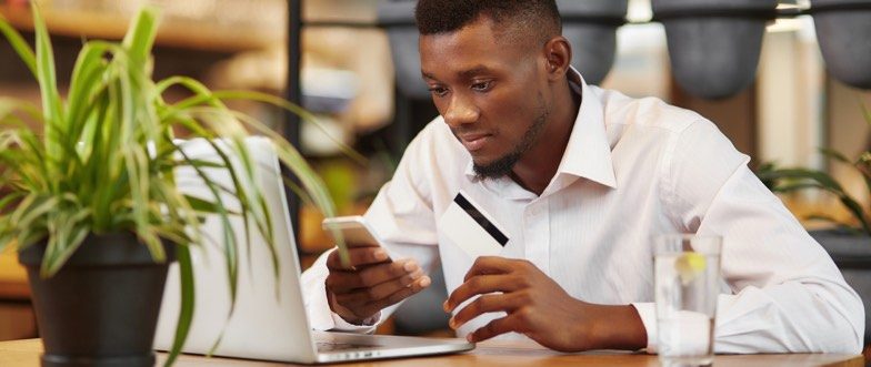 Man telling his bank hes travelling overseas through app content