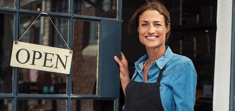 Woman opening cafe article image content