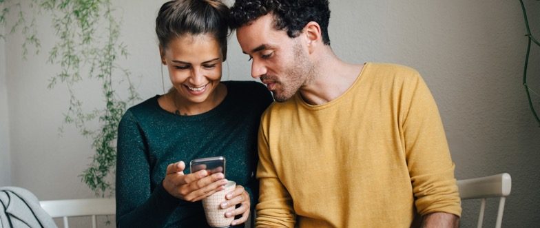 Woman and man looking at new ubank rate content