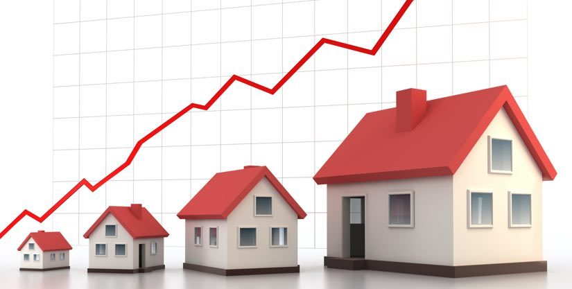 Rising mortgage rates mini houses i stock image content