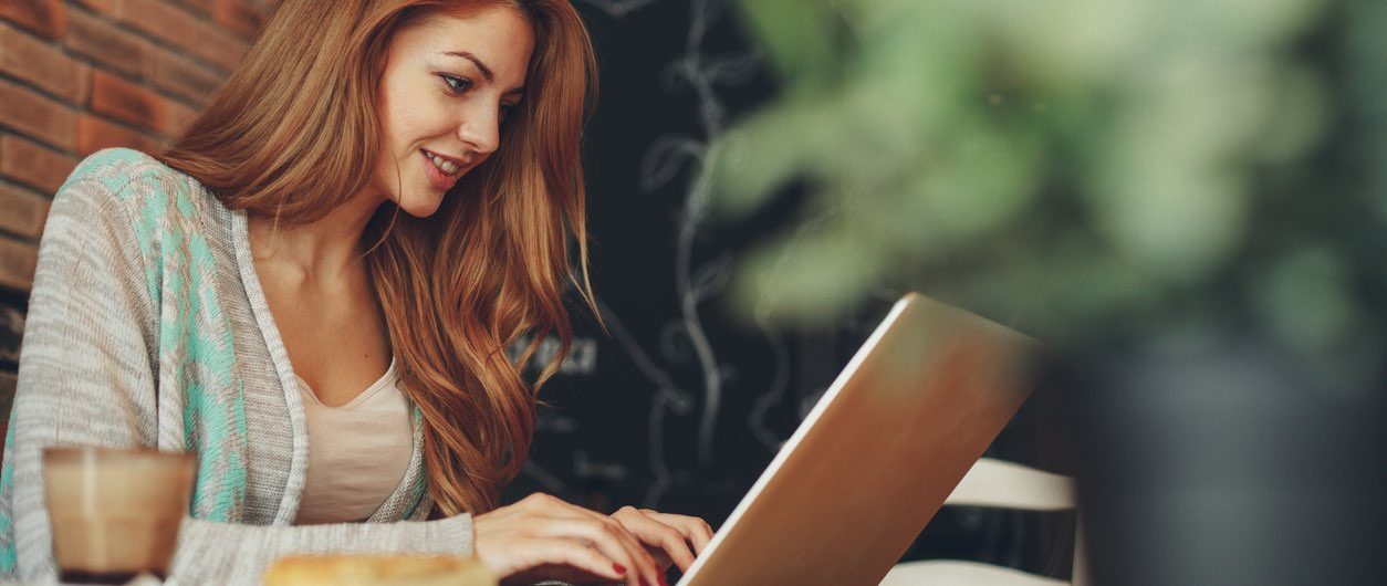 Woman looking at kogan home loans online content