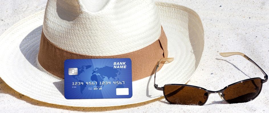 Beach money card a hat glasses and credit card on the beach content