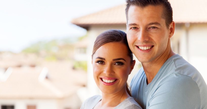M native brunette couple outside house closeup article image content