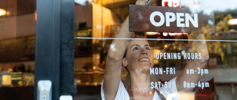 Business owner opening shop content