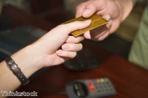 Aussies reduce their grip on credit cards