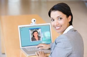 A woman maintaining her bank account with video calling.