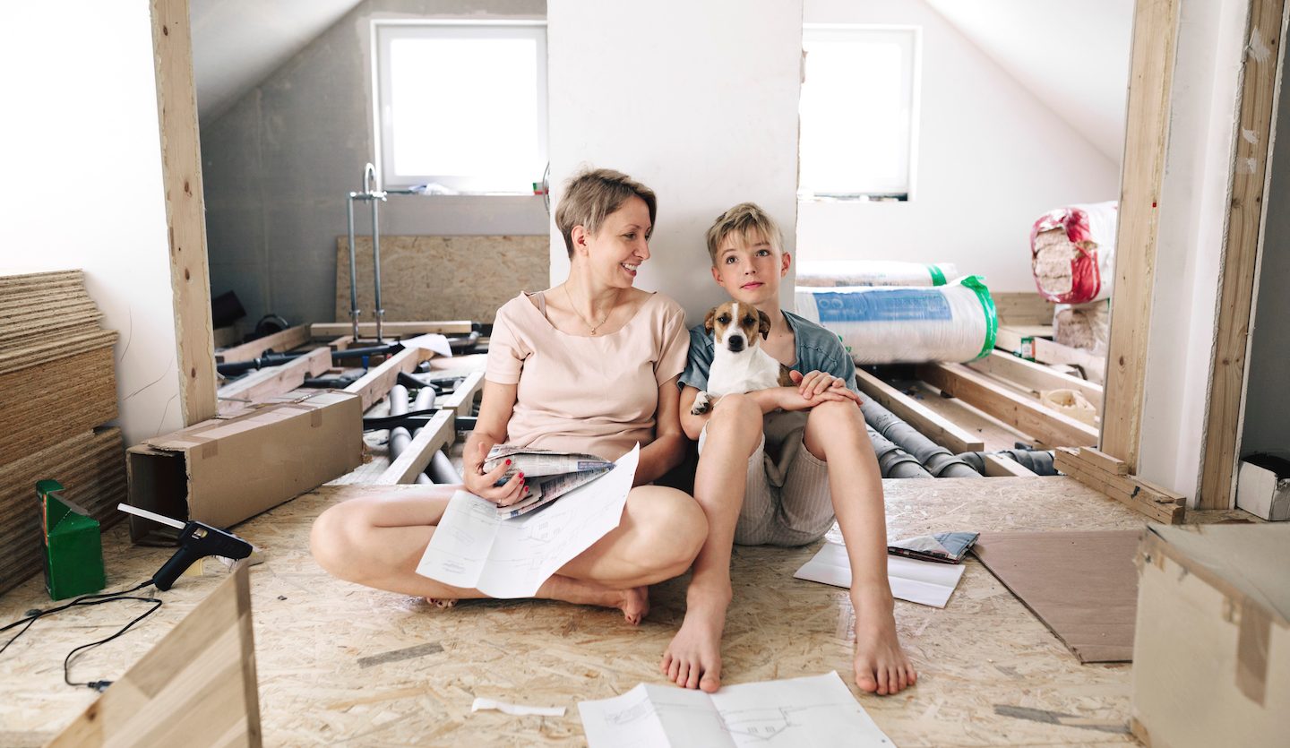 mother and son renovating house using personal loan