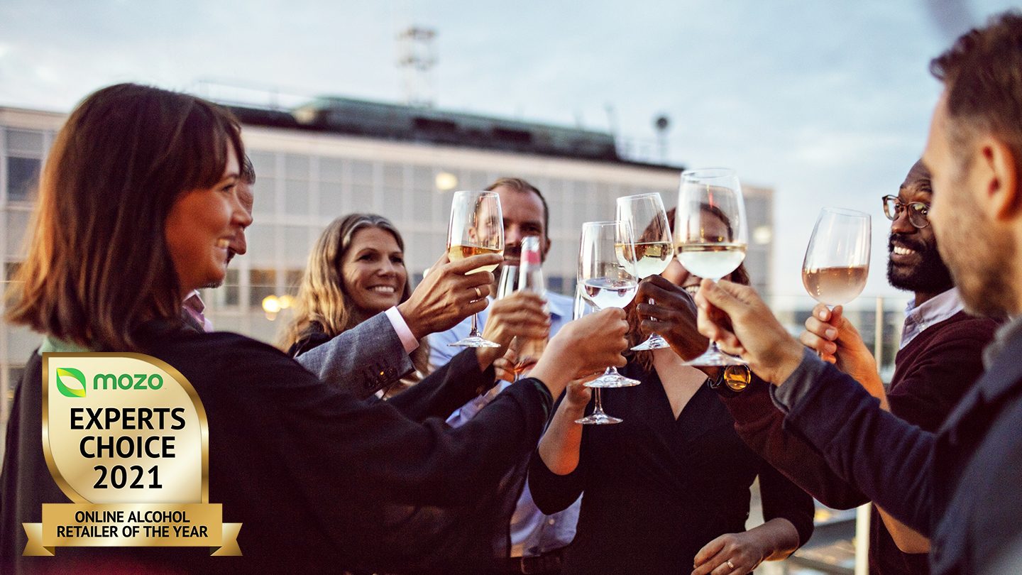 Friends toasting with wine glasses to the Mozo Experts Choice Awards for Online Alcohol.