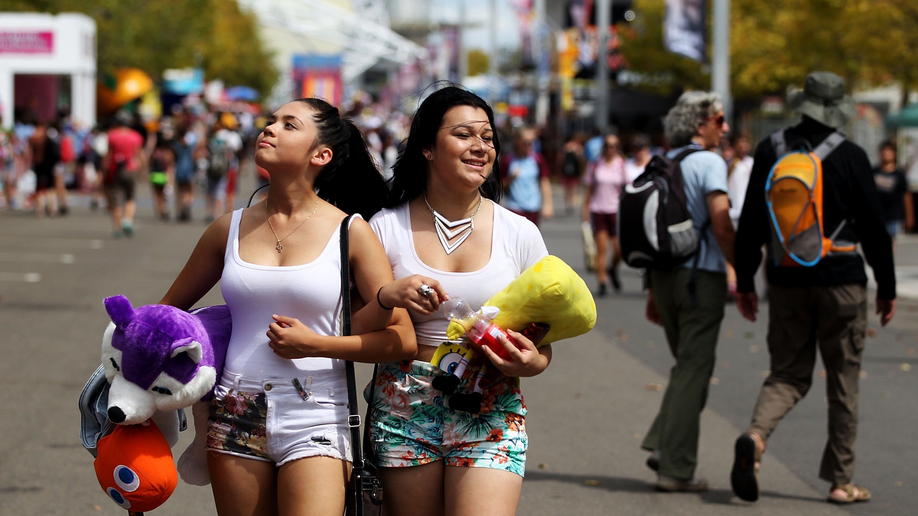 People walking at the Sydney Royal Easter Show, sticking to a budget.