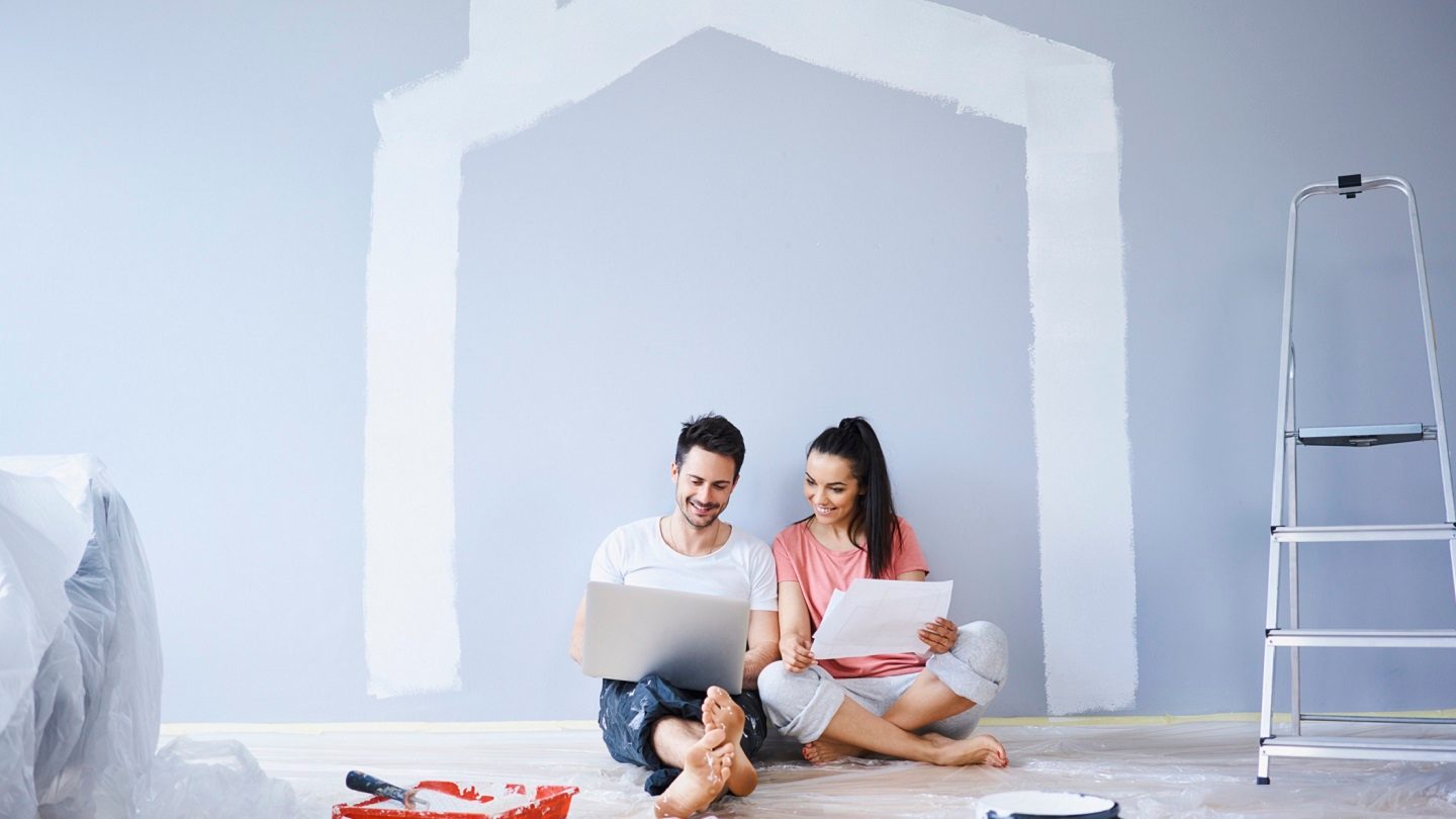 Couple looking at home loan options