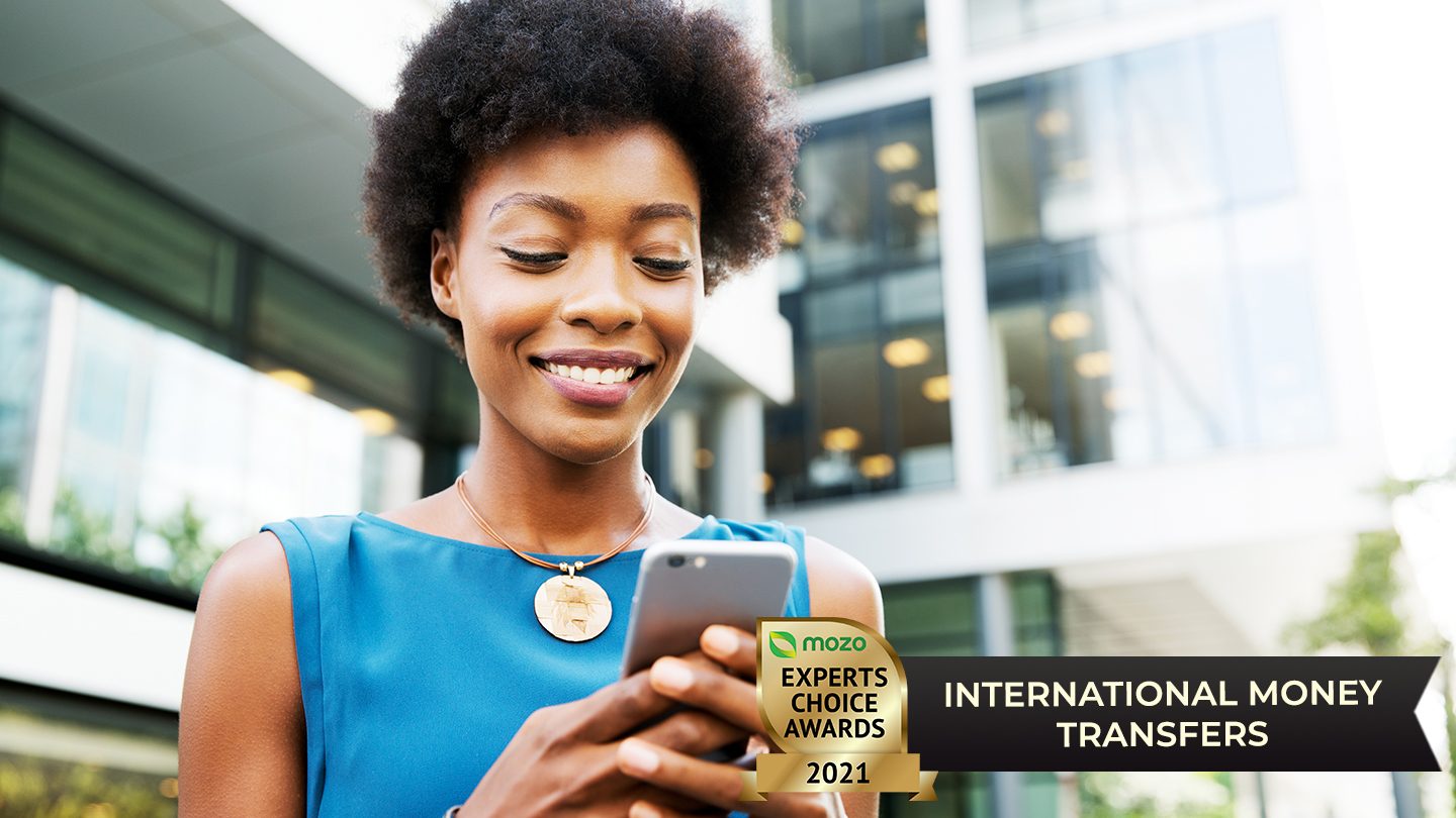 Woman using Mozo Experts Choice Award winning International Money Transfer service on her phone
