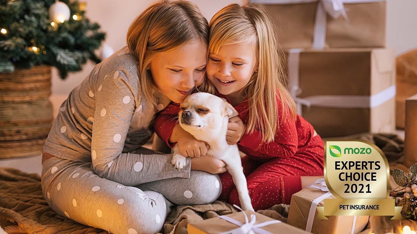 kids with a dog celebrating having the best MECA pet insurance