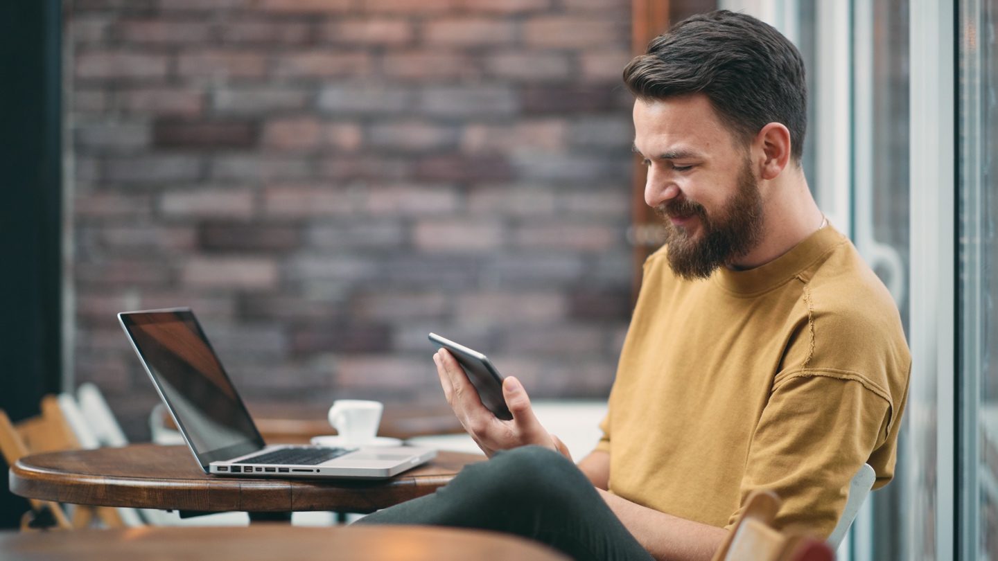 man-organising-a-balance-transfer-on-his-phone