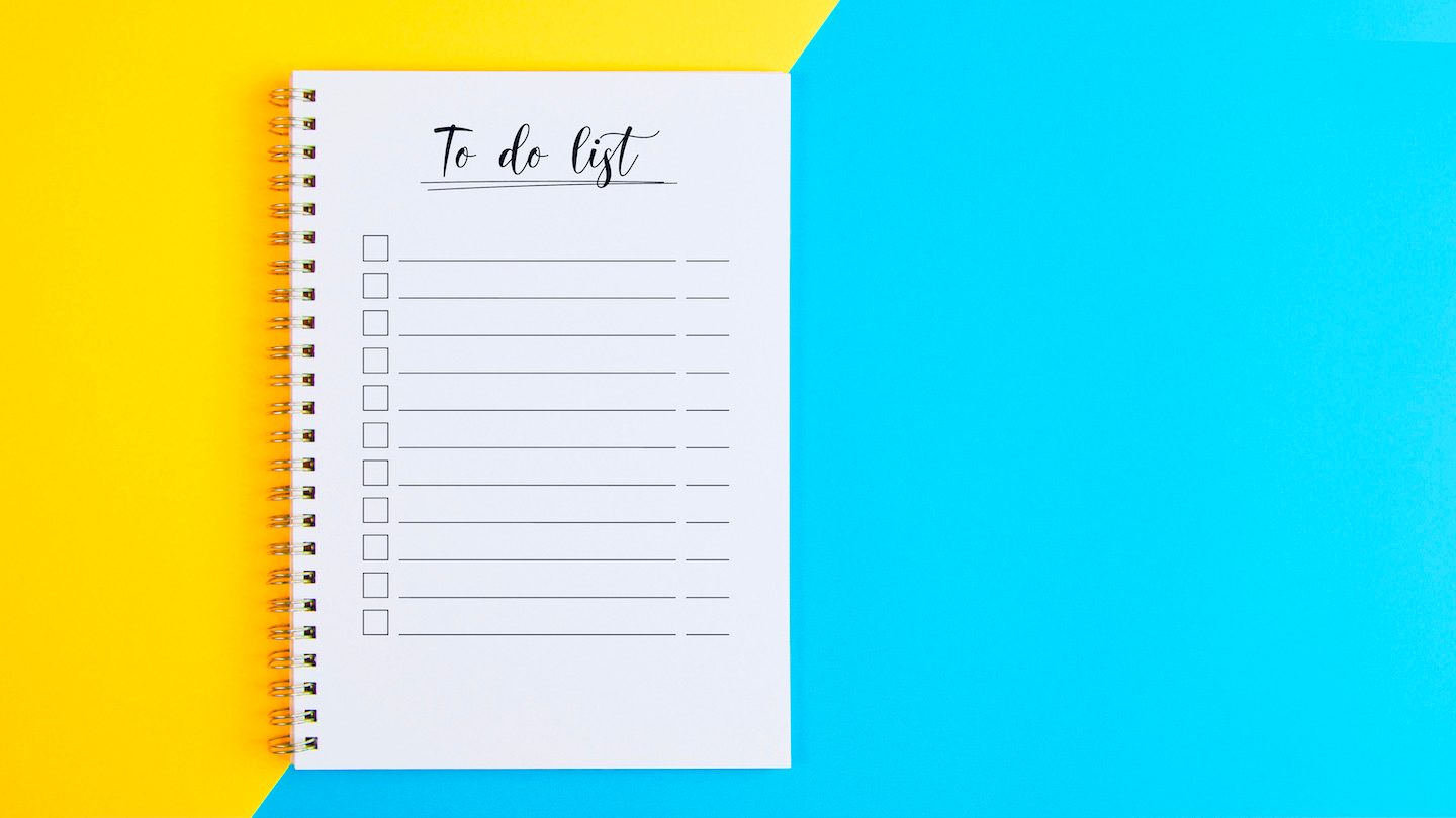 A checklist against a yellow and blue background.