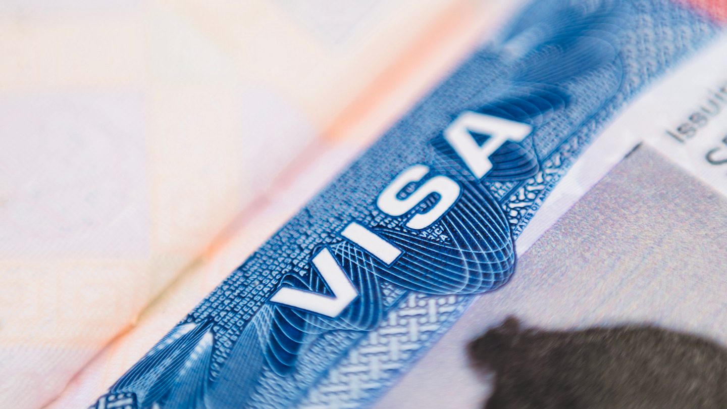 Close of a pink and blue visa logo