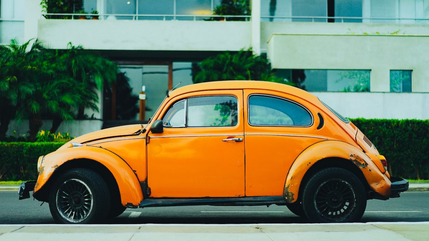 A yellow punch buggy car.