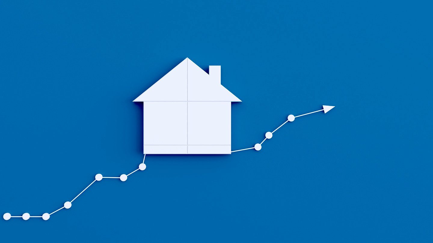 A cartoon house riding a blue graph-line trending upwards, white on blue colour scheme.