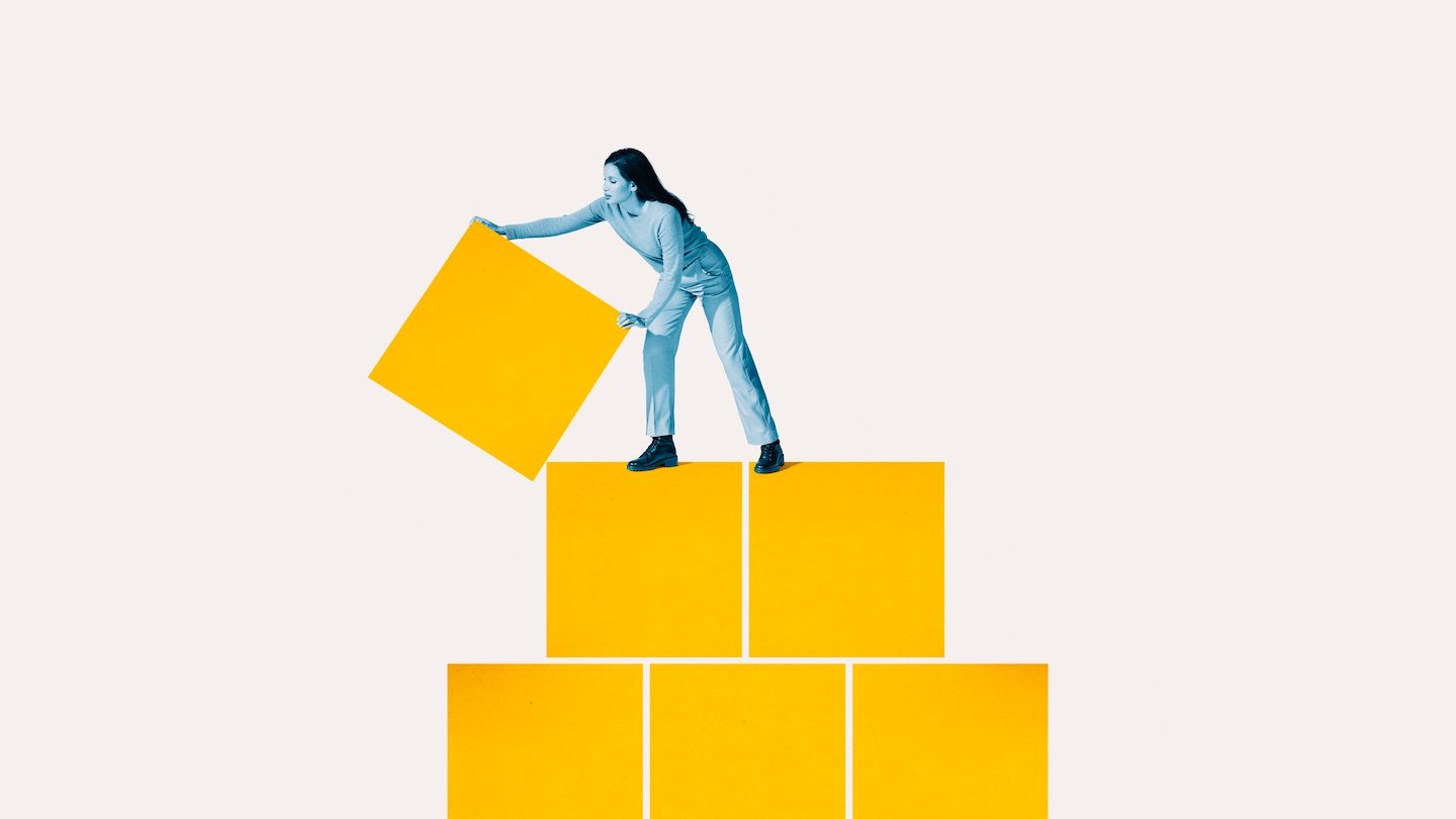 A woman loads a yellow square on top of her yellow square pyramid. Collage.