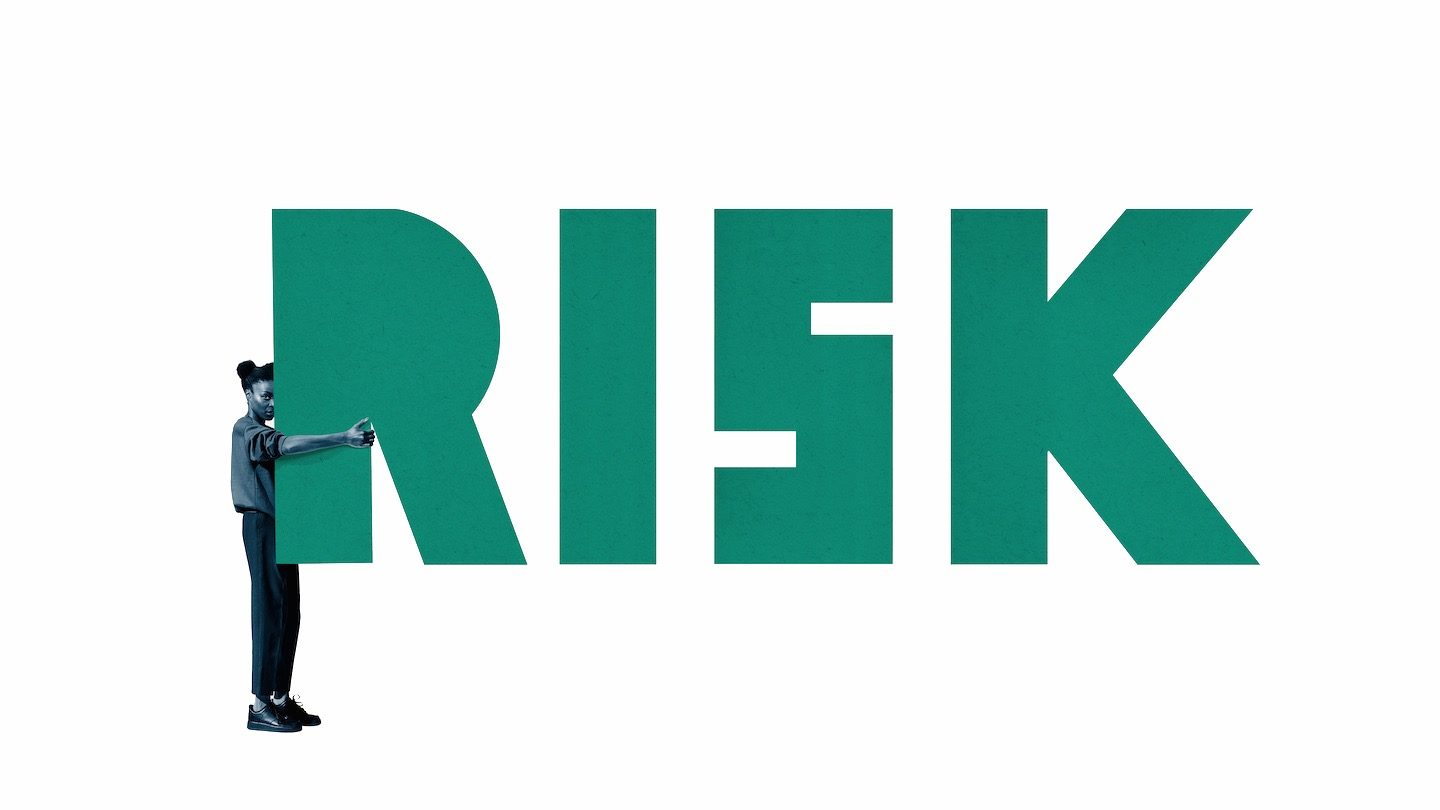 Collage of a timid young woman hugging the 'r' of RISK, because a recession might be coming.