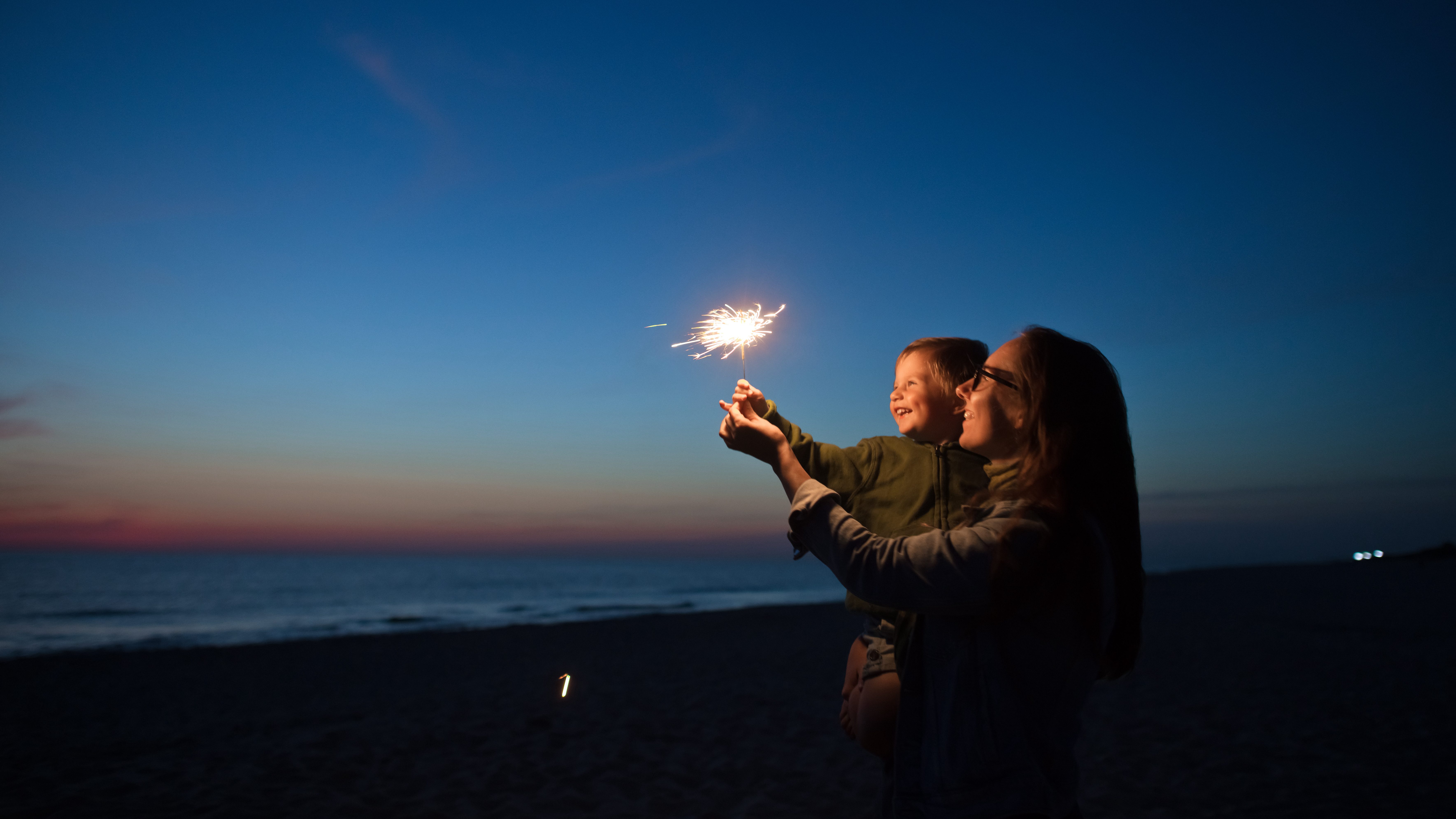 Family new year's eve NYE - fireworks - sparklers - beach