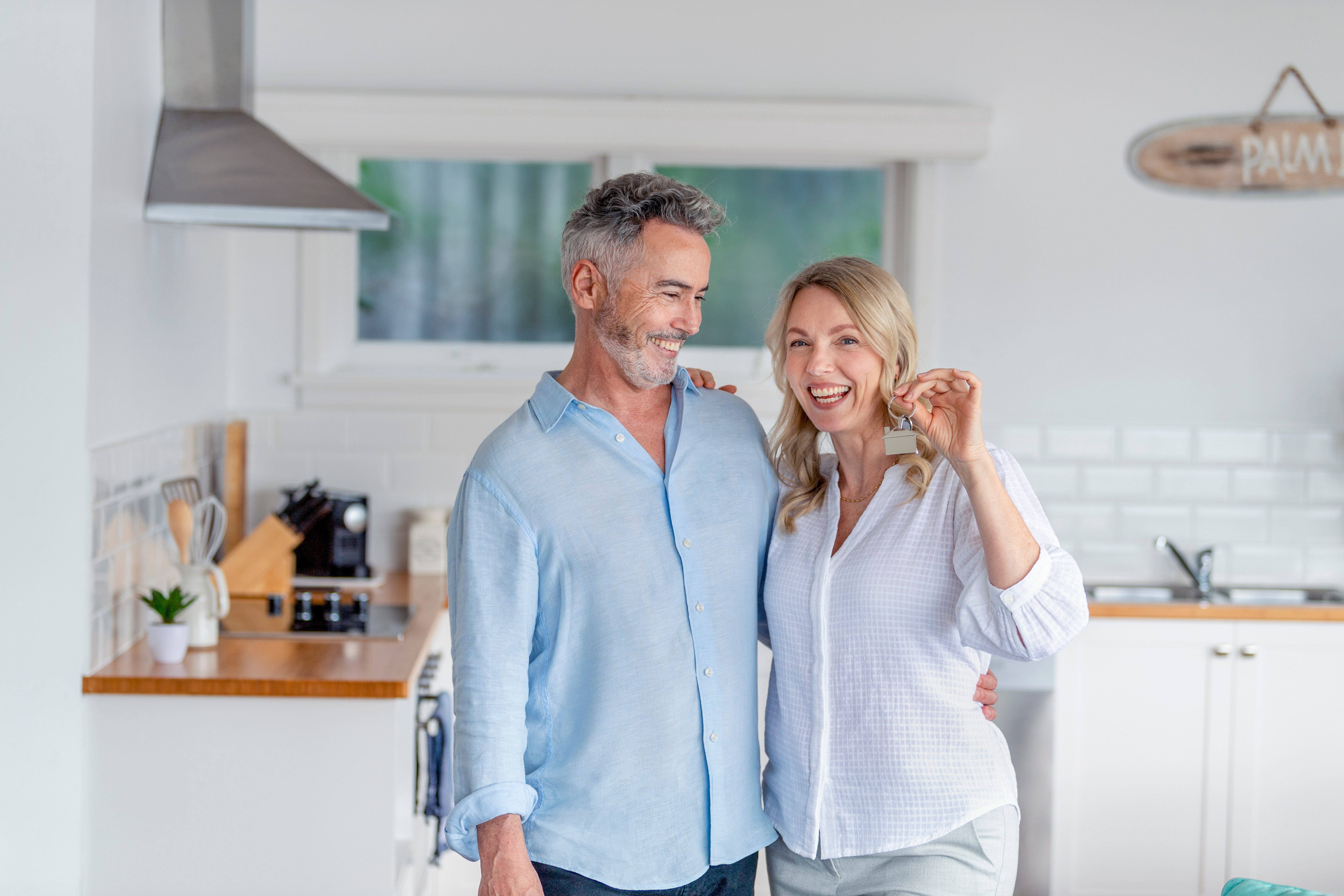 couple buying home with mortgage after comparing on mozo