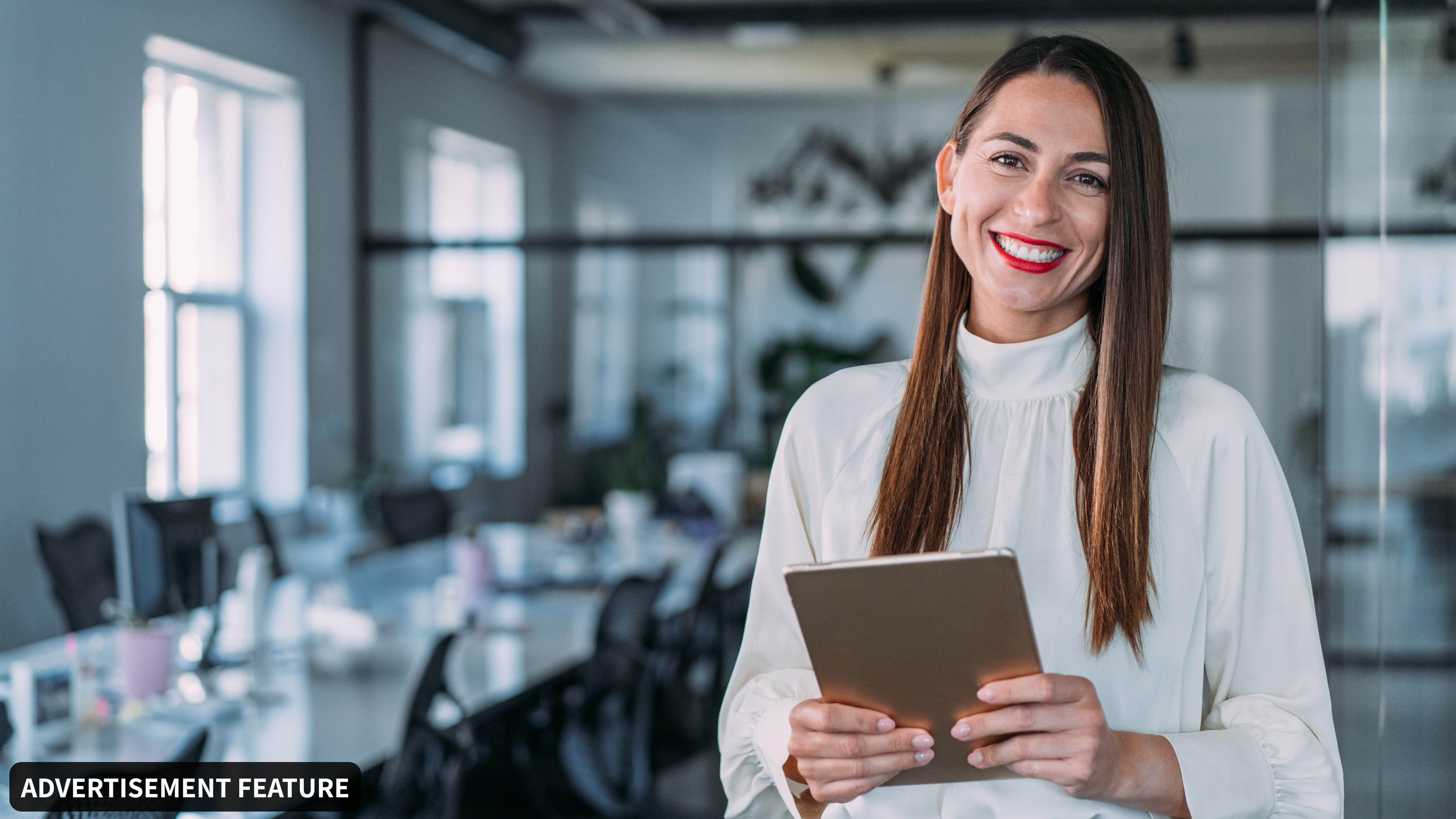Young business woman in boardroom