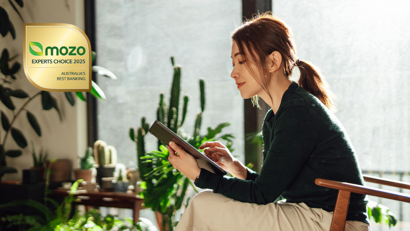 woman checking to see which banks won the best banks in the Mozo Experts Choice Awards
