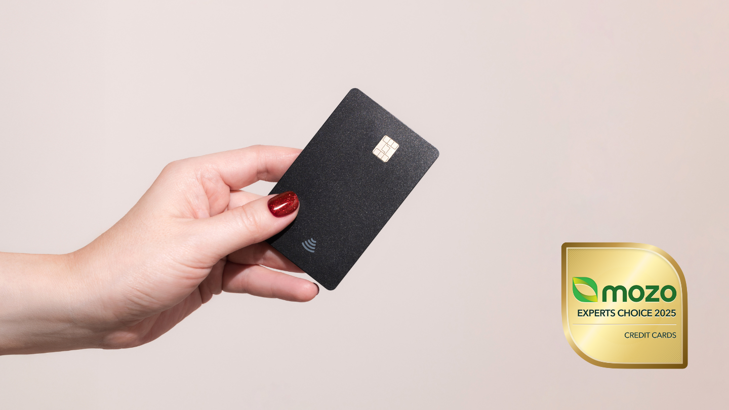 Person holding a credit card next to a Mozo Experts Choice Credit Card Award badge