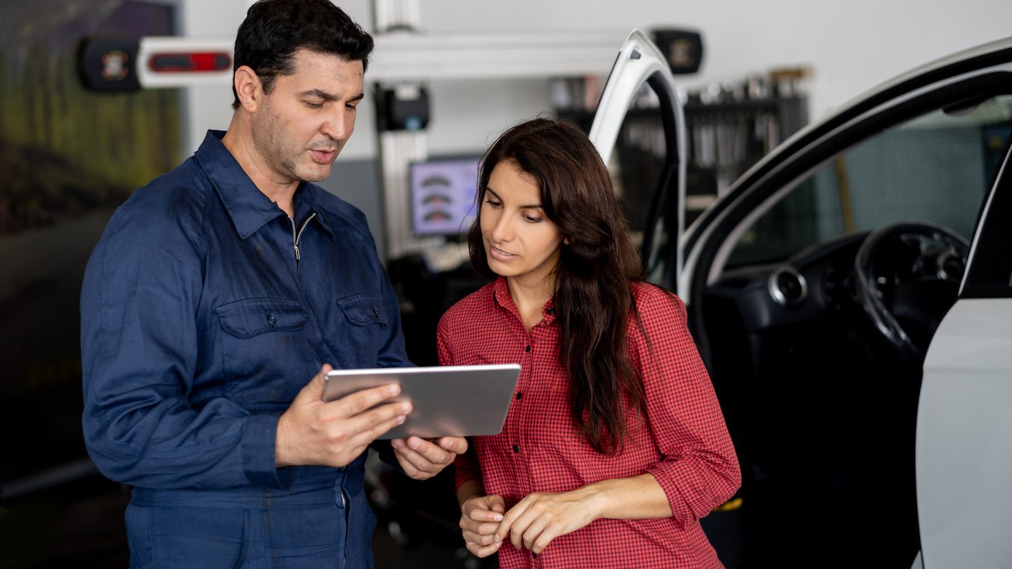 mechanic quoting customer who's using a car repair loan