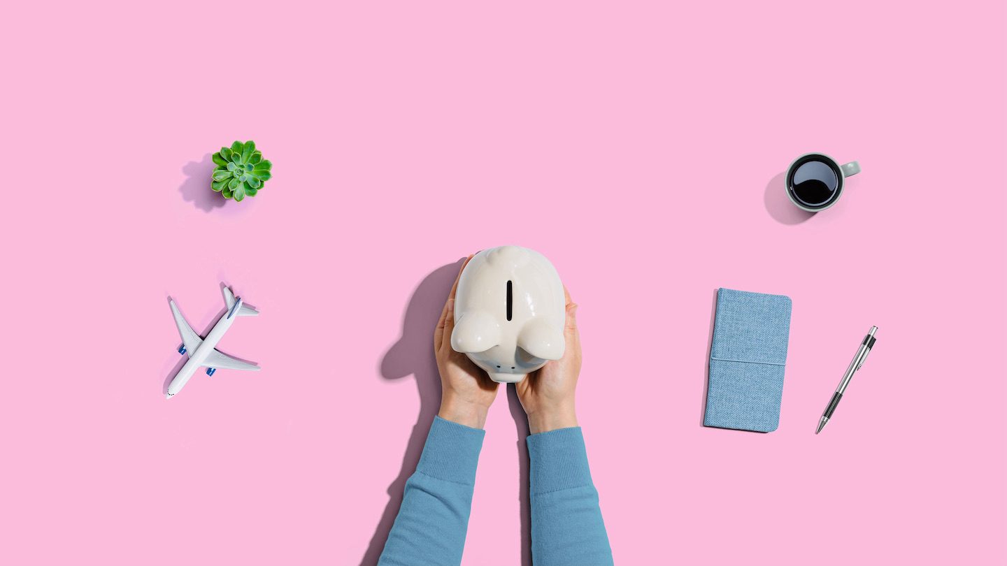 hands on a piggy bank
