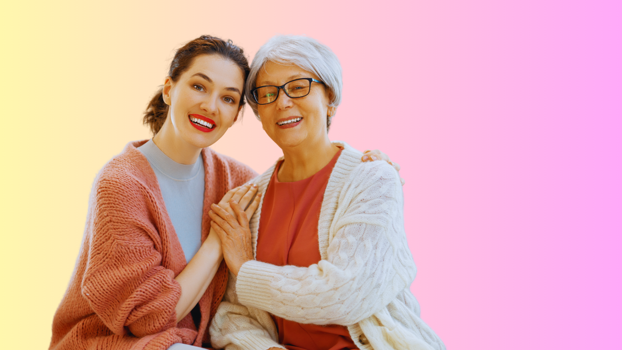 Mother and daughter grinning together.